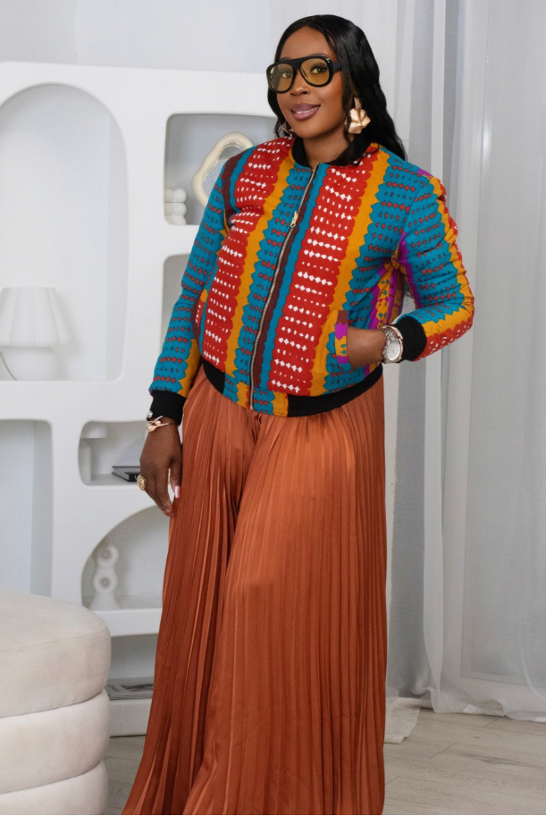 Reversible African Print Bomber Jacket with Black Viscose on the inner reverse | African print Biker Jacket | Ankara print Bomber Jacket | African Print Outerwear | African Winter style for women | sustainable African Fashion | recycled African print clothing | Ethically sourced fashion | ethically sourced clothing | handmade clothing | African clothing for women | Ankara jacket | Tribal prints kimono | Floral African print clothing | Cotton Blazer | African print workwear | African clothing UK