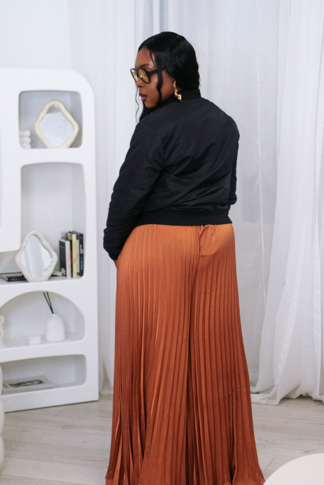 Reversible African Print Bomber Jacket with Black Viscose on the inner reverse | African print Biker Jacket | Ankara print Bomber Jacket | African Print Outerwear | African Winter style for women | sustainable African Fashion | recycled African print clothing | Ethically sourced fashion | ethically sourced clothing | handmade clothing | African clothing for women | Ankara jacket | Tribal prints kimono | Floral African print clothing | Cotton Blazer | African print workwear | African clothing UK