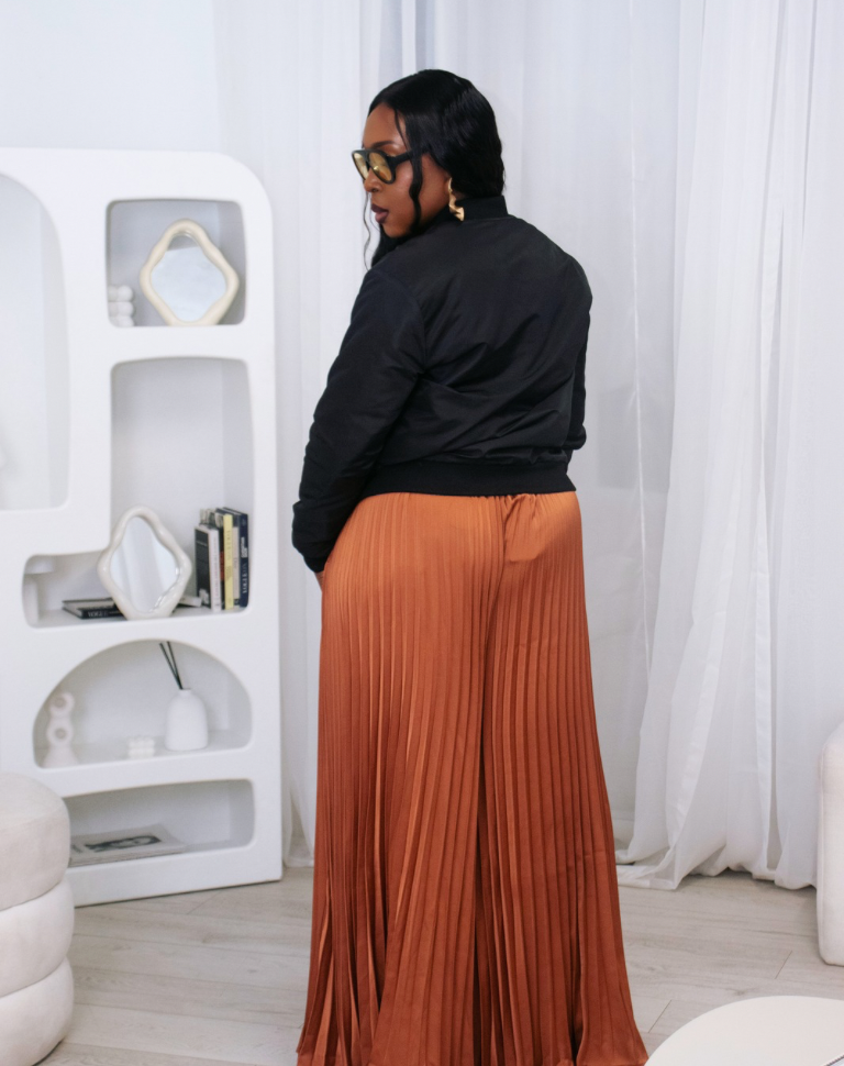 Reversible African Print Bomber Jacket with Black Viscose on the inner reverse | African print Biker Jacket | Ankara print Bomber Jacket | African Print Outerwear | African Winter style for women | sustainable African Fashion | recycled African print clothing | Ethically sourced fashion | ethically sourced clothing | handmade clothing | African clothing for women | Ankara jacket | Tribal prints kimono | Floral African print clothing | Cotton Blazer | African print workwear | African clothing UK