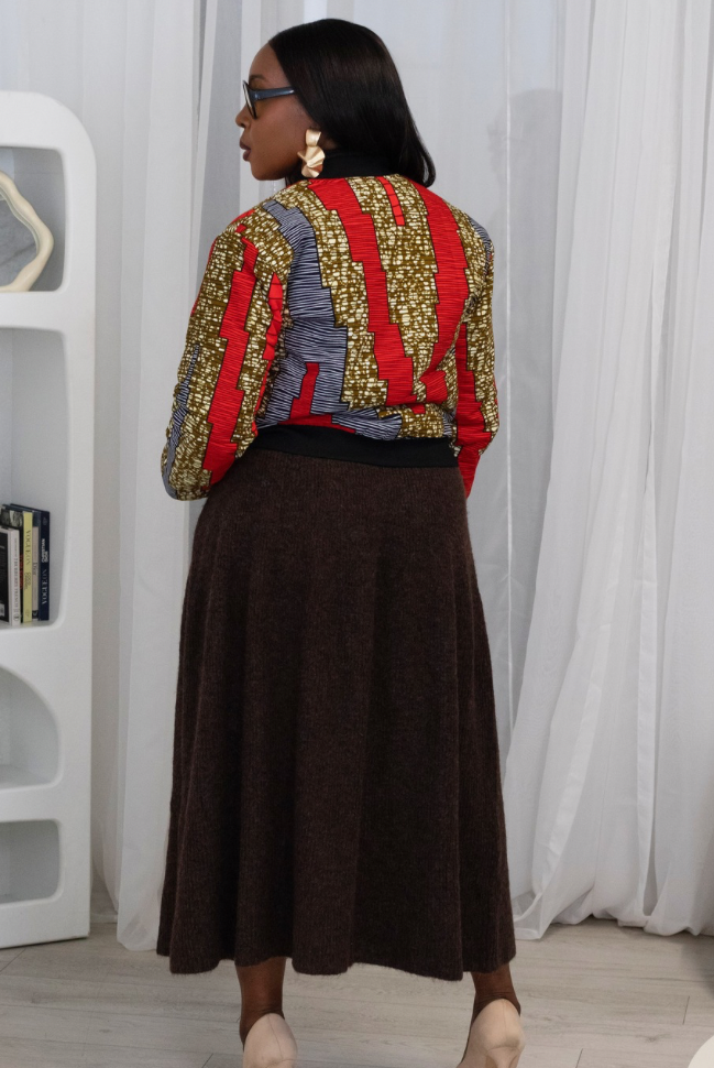 Reversible African Print Bomber Jacket with Black Viscose on the inner reverse | African print Biker Jacket | Ankara print Bomber Jacket | African Print Outerwear | African Winter style for women | sustainable African Fashion | recycled African print clothing | Ethically sourced fashion | ethically sourced clothing | handmade clothing | African clothing for women | Ankara jacket | Tribal prints kimono | Floral African print clothing | Cotton Blazer | African print workwear | African clothing UK