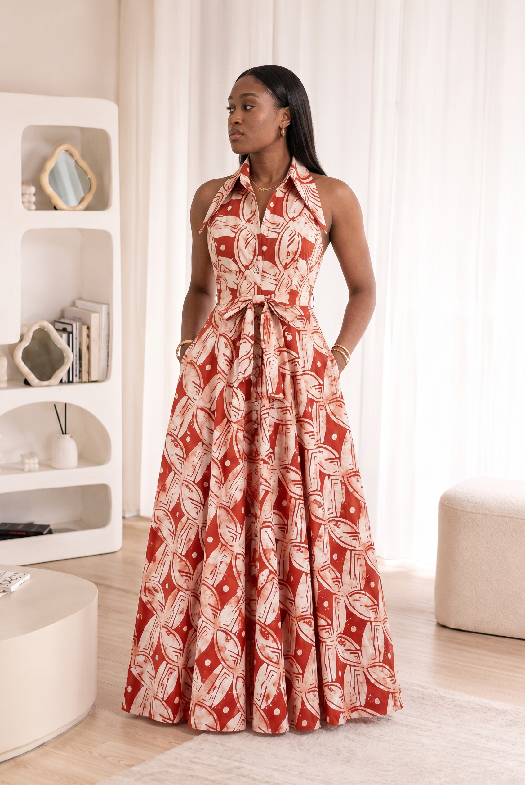 African Adire maxi dress, African print maxi dress UK, navy batik dress, halter maxi dress, African fashion UK, African wedding guest dress, luxury African clothing, contemporary African dress, cotton maxi dress with pockets, women's African clothing, CUMO London dress, African Adire clothing, elegant maxi dress, occasion dress UK, full skirt maxi dress. Kampala dresses, Adire outfits