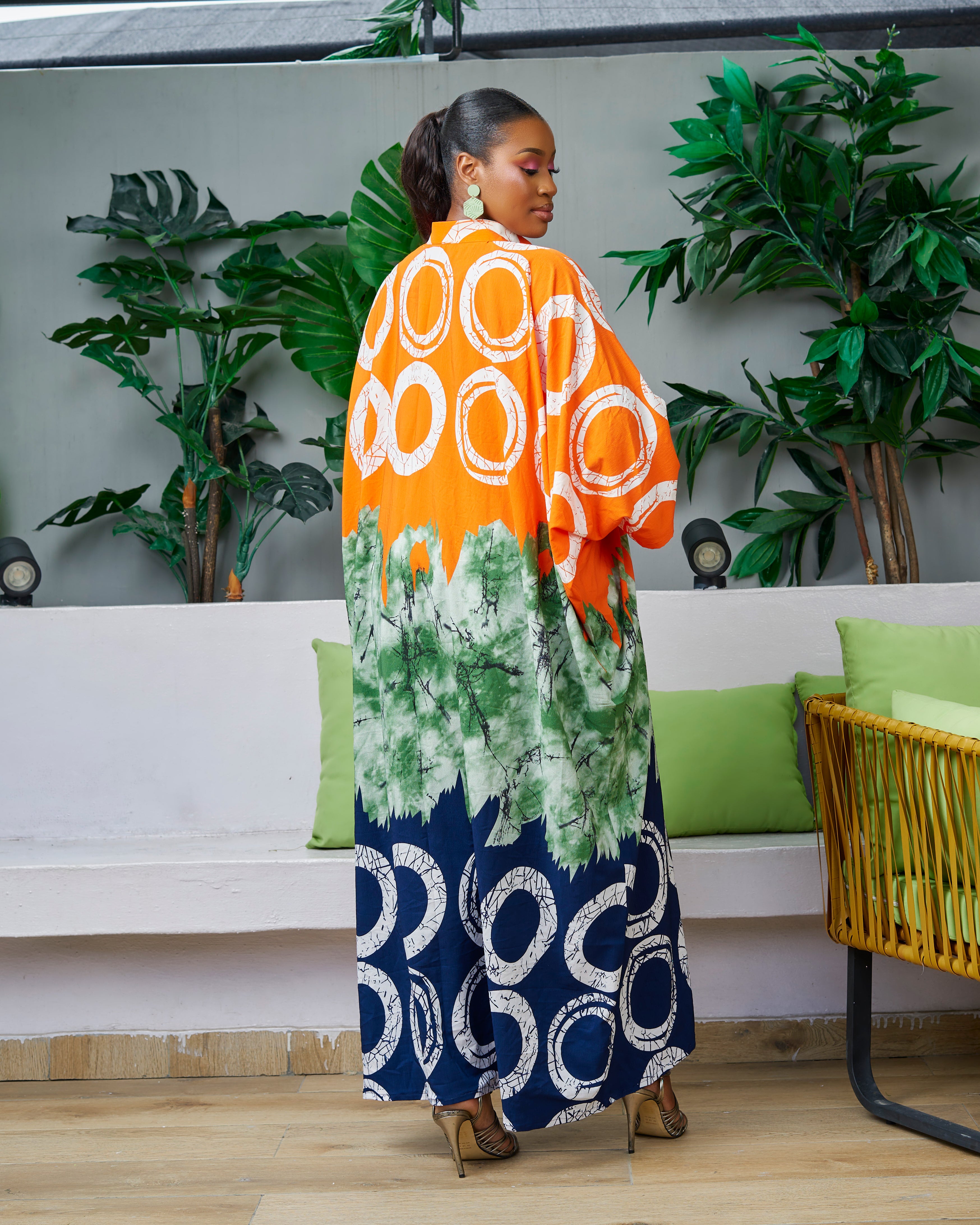 Discover trendy African clothing from CUMO London. This multicoloured V neckline African print Kaftan boubou is handmade featuring frill sleeves. One size fits all African boubou in vibrant bold colour African Print Cover-ups Beach Tunics - Dashiki Kaftan Beach Dress |Boubou dress| African maxi gown| African kaftan | African bubu | African boubou | Midi Kaftan Bubu | African Maxi dresses |
