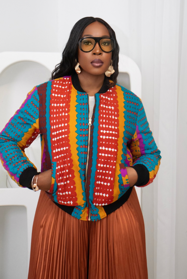 Reversible African Print Bomber Jacket with Black Viscose on the inner reverse | African print Biker Jacket | Ankara print Bomber Jacket | African Print Outerwear | African Winter style for women | sustainable African Fashion | recycled African print clothing | Ethically sourced fashion | ethically sourced clothing | handmade clothing | African clothing for women | Ankara jacket | Tribal prints kimono | Floral African print clothing | Cotton Blazer | African print workwear | African clothing UK