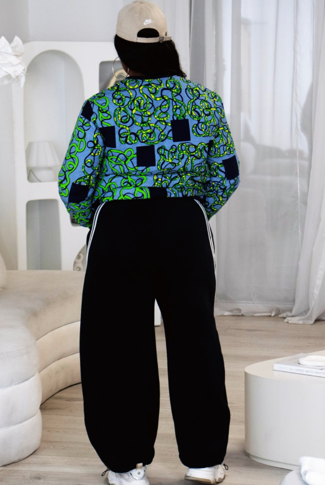 Reversible African Print Bomber Jacket with Denim on the inner reverse | African print Biker Jacket | Ankara print Bomber Jacket | African Print Outerwear | African Winter style for women | sustainable African Fashion | recycled African print clothing | Ethically sourced fashion | ethically sourced clothing | handmade clothing | African clothing for women | Ankara jacket | Tribal prints kimono | Floral African print clothing | Cotton Blazer | African print workwear | African clothing UK