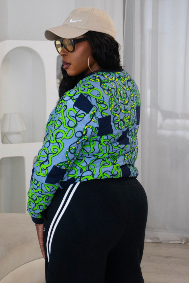 Reversible African Print Bomber Jacket with Denim on the inner reverse | African print Biker Jacket | Ankara print Bomber Jacket | African Print Outerwear | African Winter style for women | sustainable African Fashion | recycled African print clothing | Ethically sourced fashion | ethically sourced clothing | handmade clothing | African clothing for women | Ankara jacket | Tribal prints kimono | Floral African print clothing | Cotton Blazer | African print workwear | African clothing UK