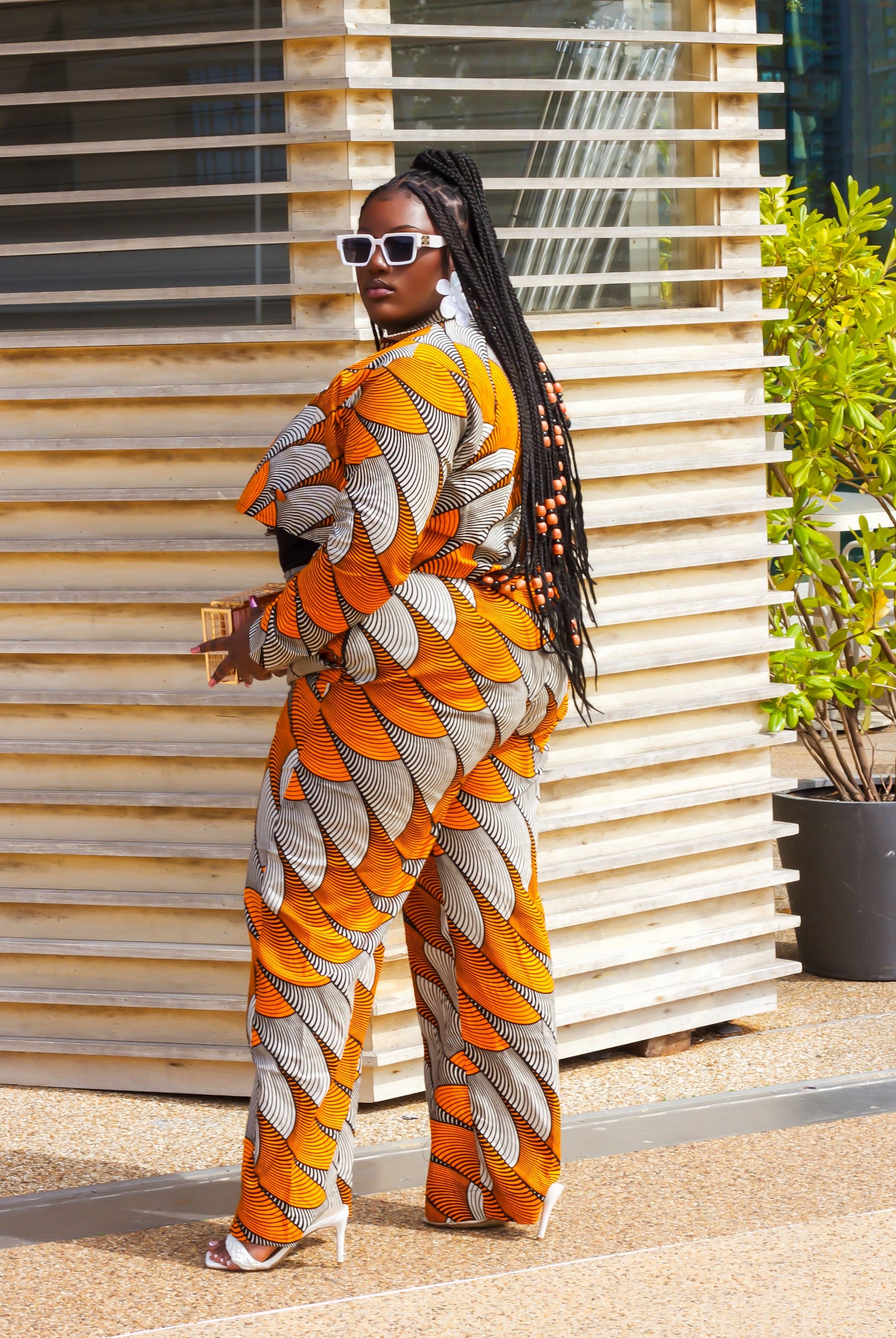 African print wide leg trousers | African print trousers UK | African print pants | African Print wide leg pants | African print clothing UK | Ready to wear African print pants | African Trouser styles | African clothing | African outfit | Ankara print Trousers | Ankara pants for Women | Ankara Styles Trousers for ladies | African pallazo Trousers | Danshiki Trousers | High waist African print wide leg pants | African high waist pants| African loose fit Trousers | African print Trousers