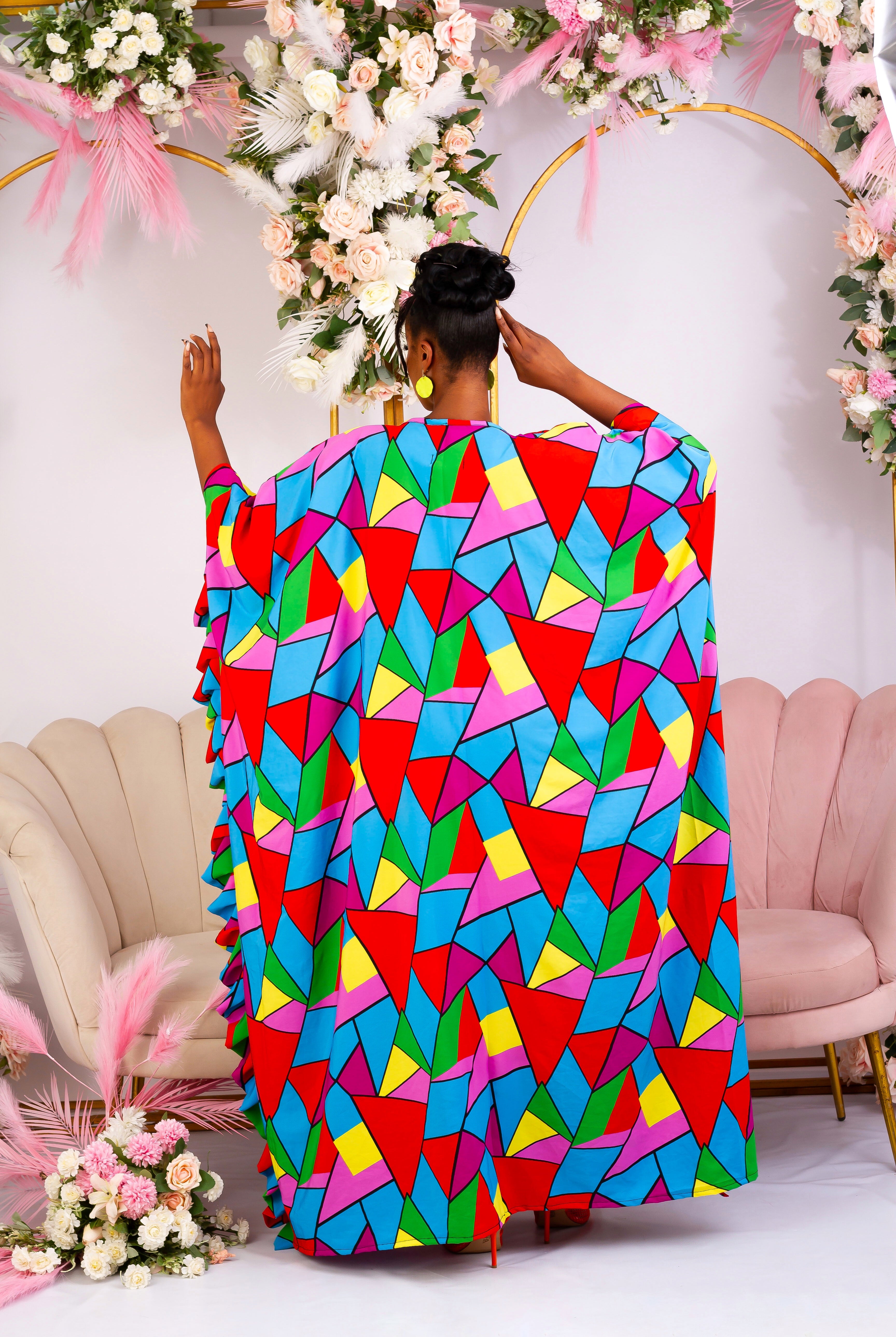 Back view of our summery African kaftan boubou. Shop African inspired clothing, African boubou, bubu, Maxi  Kaftan, African crepe gown, this long bubu kaftan for women  is handmade with multicoloured crepe fabric. V neckline with frill sleeves.