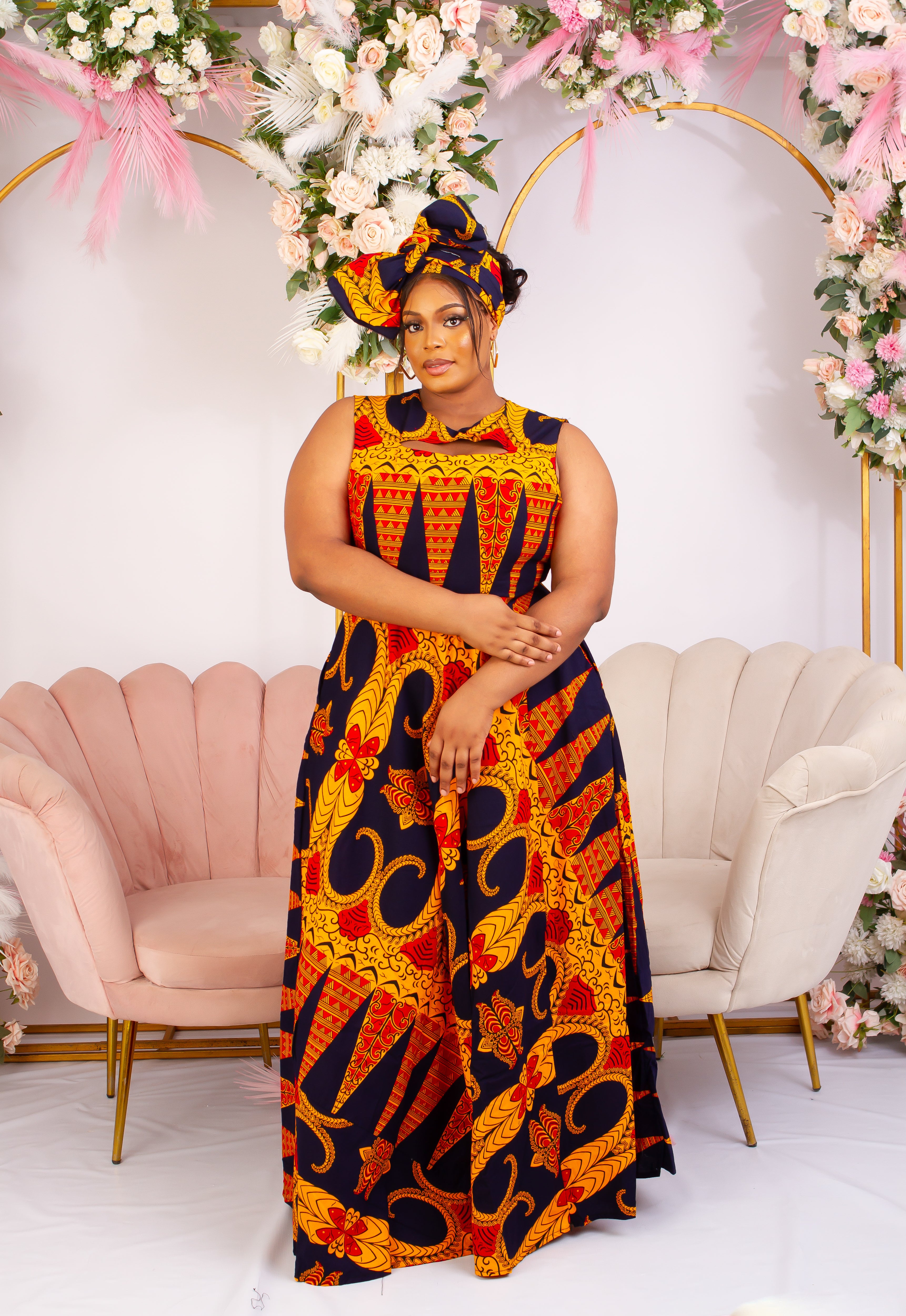 Vibrant Yellow and Navy Blue African Print flare maxi dress perfect for a special occasion. Sleeveless with bust cut out for an edgy and chic look. Shop Ghana African print dress | African maxi dresses | African print gown | African Clothing Online  Shop | Maxi African dress |  African women's clothing  | kitenge dresses | Africa Dresses for Women | African dresses for wedding | Danshiki Dress | Trendy African Dress | African clothing UK