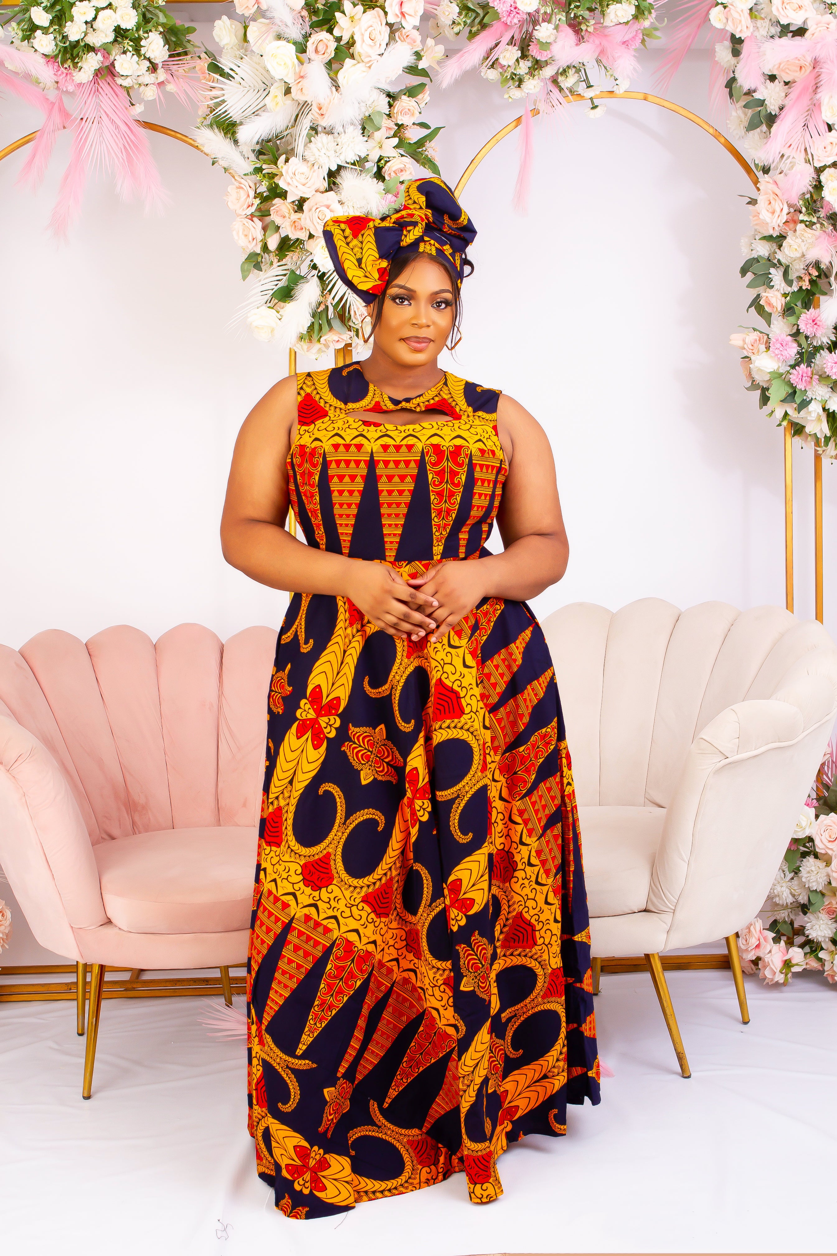 Vibrant Yellow and Navy Blue African Print flare maxi dress perfect for a special occasion. Sleeveless with bust cut out for an edgy and chic look. Shop Ghana African print dress | African maxi dresses | African print gown | African Clothing Online  Shop | Maxi African dress |  African women's clothing  | kitenge dresses | Africa Dresses for Women | African dresses for wedding | Danshiki Dress | Trendy African Dress | African clothing UK