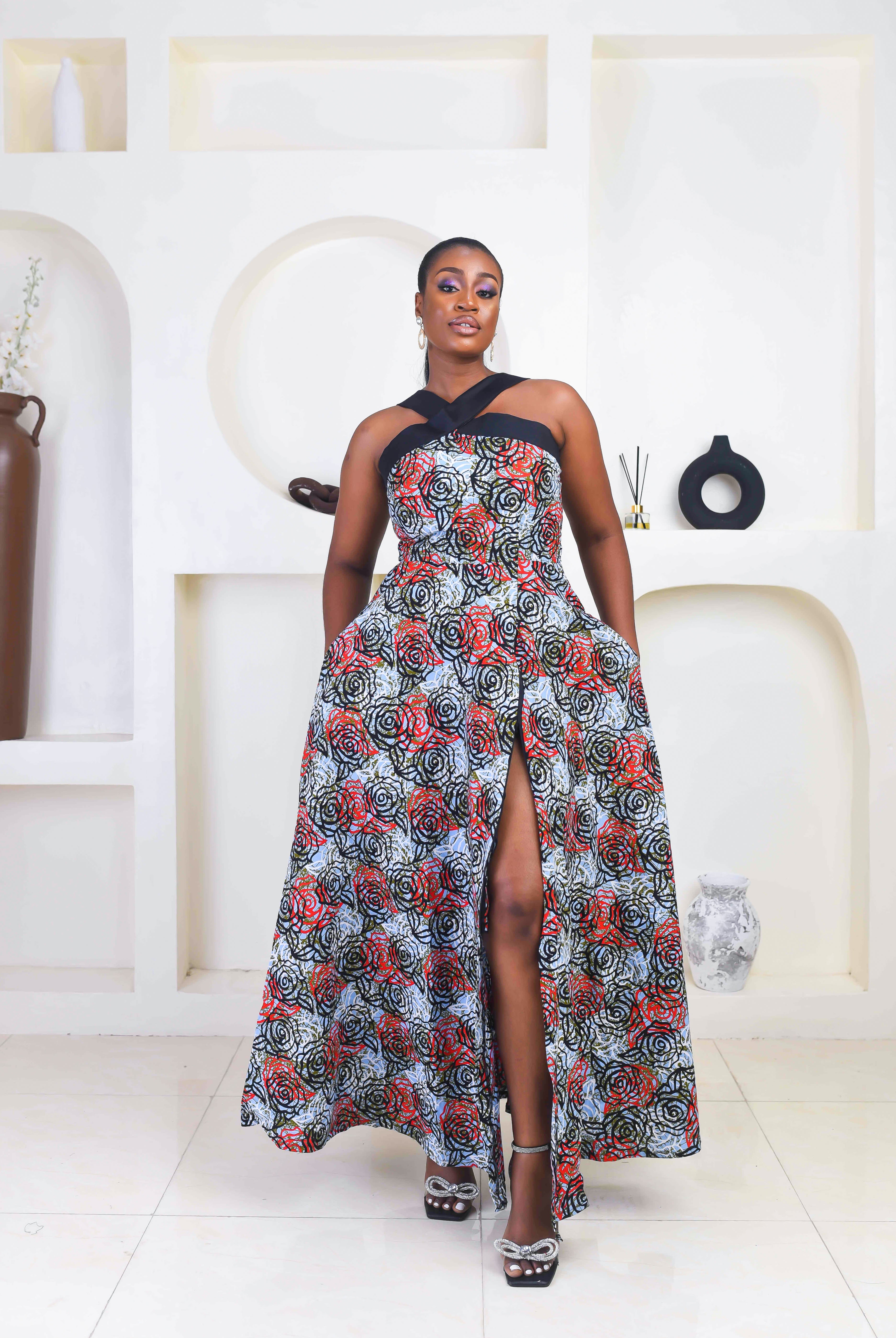 Vibrant Yellow and Navy Blue African Print flare maxi dress perfect for a special occasion. Sleeveless with bust cut out for an edgy and chic look. Shop Ghana African print dress | African maxi dresses | African print gown | African Clothing Online Shop | Maxi African dress | African women's clothing | kitenge dresses | Africa Dresses for Women | African dresses for wedding | Danshiki Dress | Trendy African Dress | African clothing UK