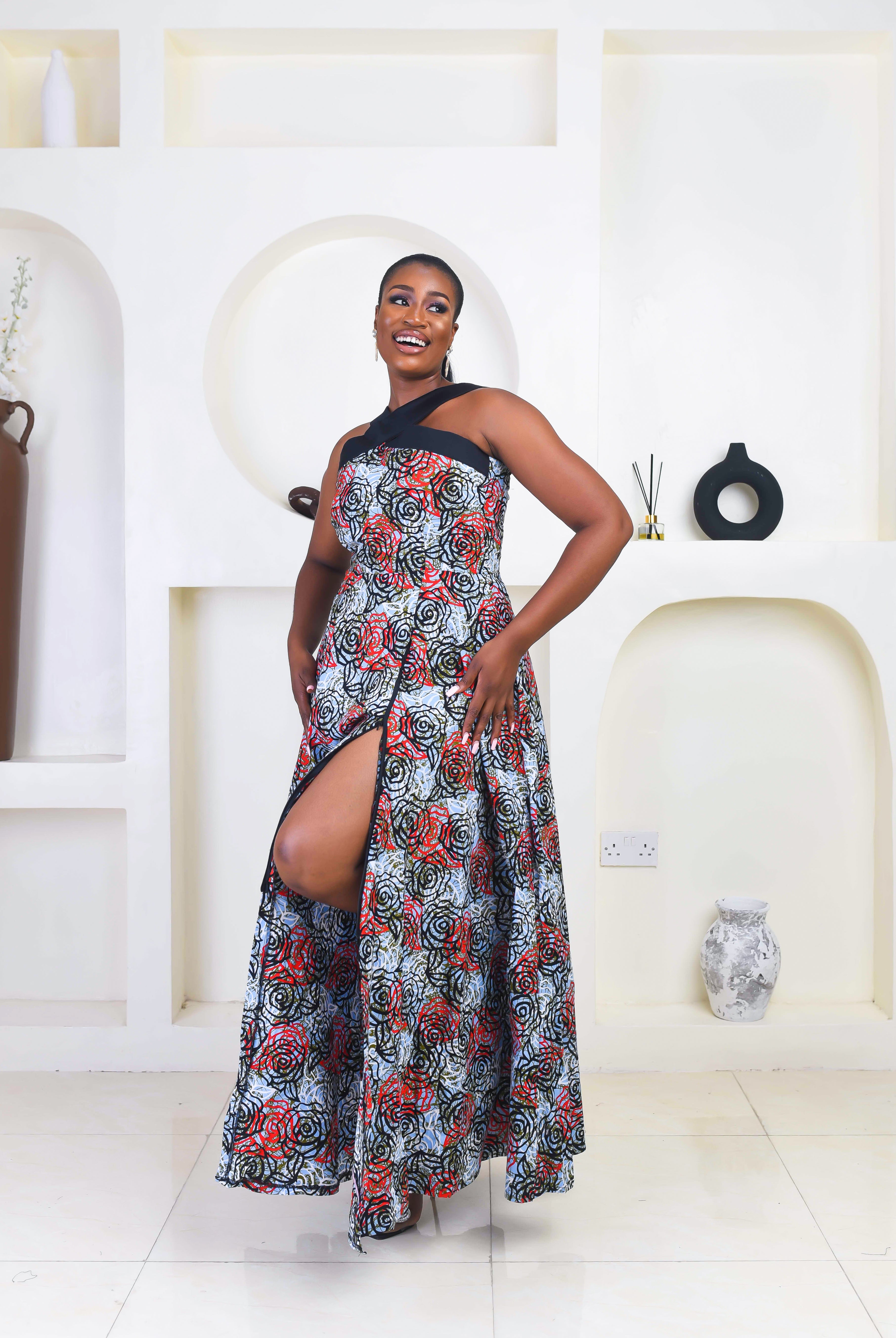 Vibrant Yellow and Navy Blue African Print flare maxi dress perfect for a special occasion. Sleeveless with bust cut out for an edgy and chic look. Shop Ghana African print dress | African maxi dresses | African print gown | African Clothing Online Shop | Maxi African dress | African women's clothing | kitenge dresses | Africa Dresses for Women | African dresses for wedding | Danshiki Dress | Trendy African Dress | African clothing UK