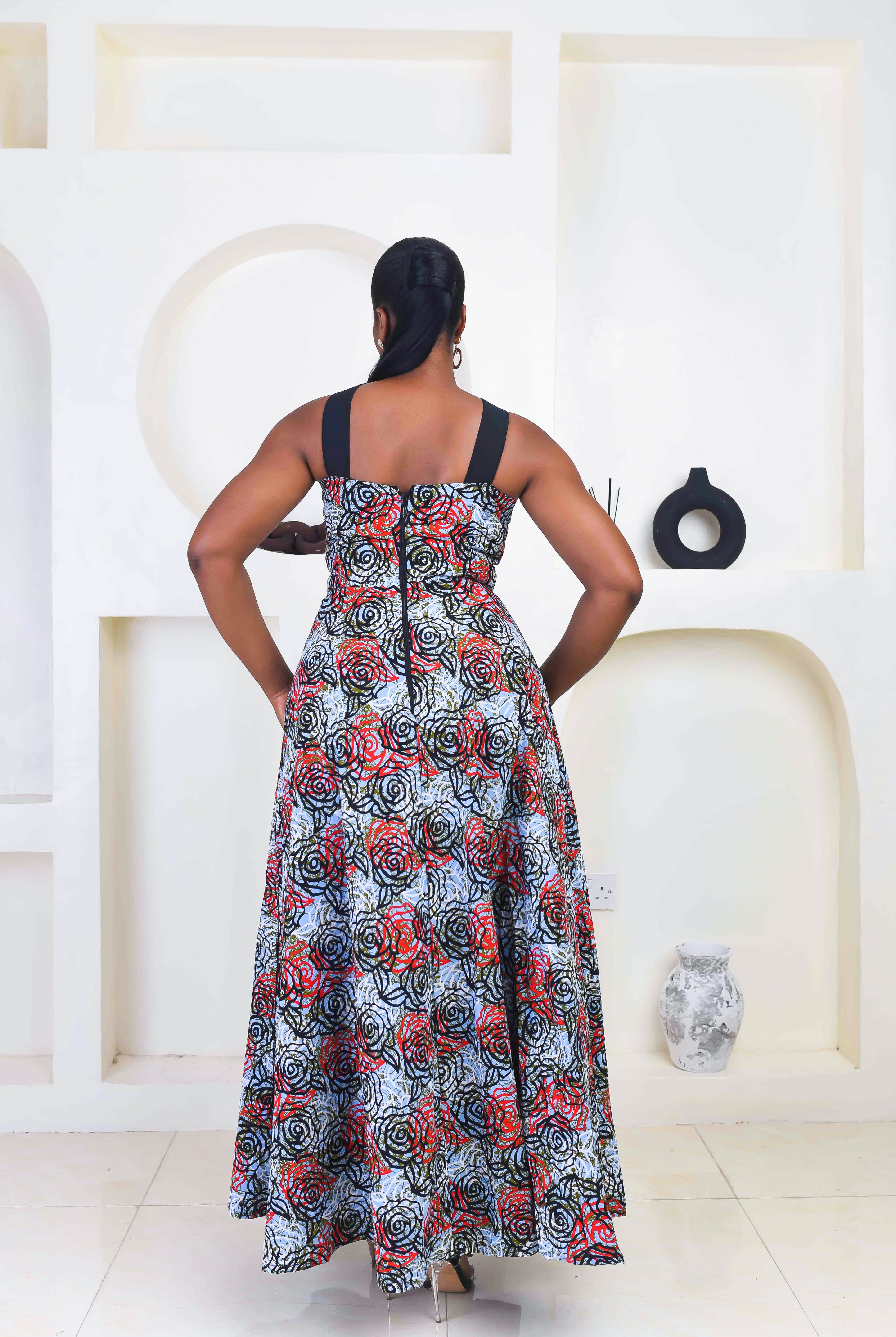 Vibrant Yellow and Navy Blue African Print flare maxi dress perfect for a special occasion. Sleeveless with bust cut out for an edgy and chic look. Shop Ghana African print dress | African maxi dresses | African print gown | African Clothing Online Shop | Maxi African dress | African women's clothing | kitenge dresses | Africa Dresses for Women | African dresses for wedding | Danshiki Dress | Trendy African Dress | African clothing UK