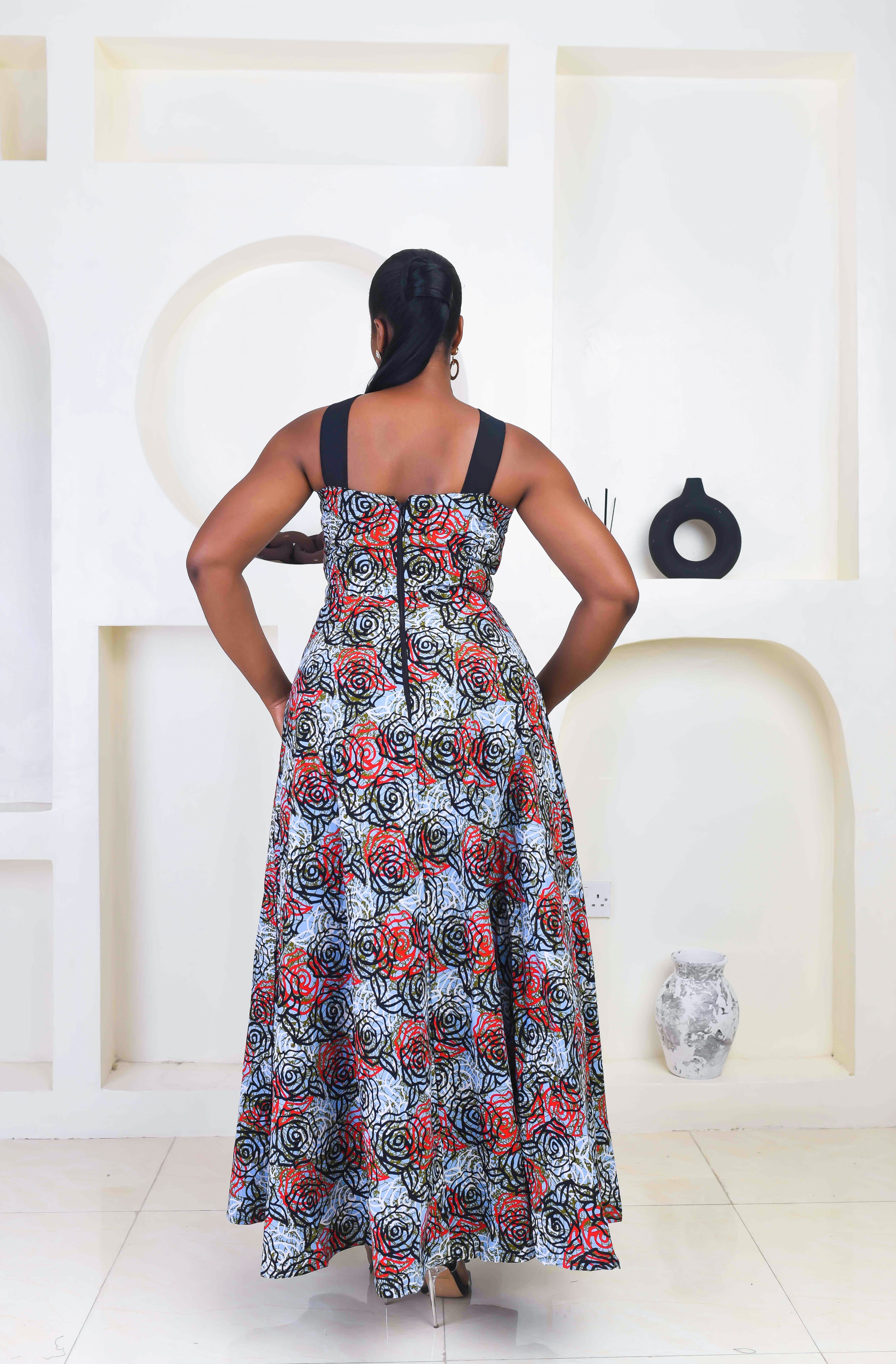 Vibrant Yellow and Navy Blue African Print flare maxi dress perfect for a special occasion. Sleeveless with bust cut out for an edgy and chic look. Shop Ghana African print dress | African maxi dresses | African print gown | African Clothing Online Shop | Maxi African dress | African women's clothing | kitenge dresses | Africa Dresses for Women | African dresses for wedding | Danshiki Dress | Trendy African Dress | African clothing UK