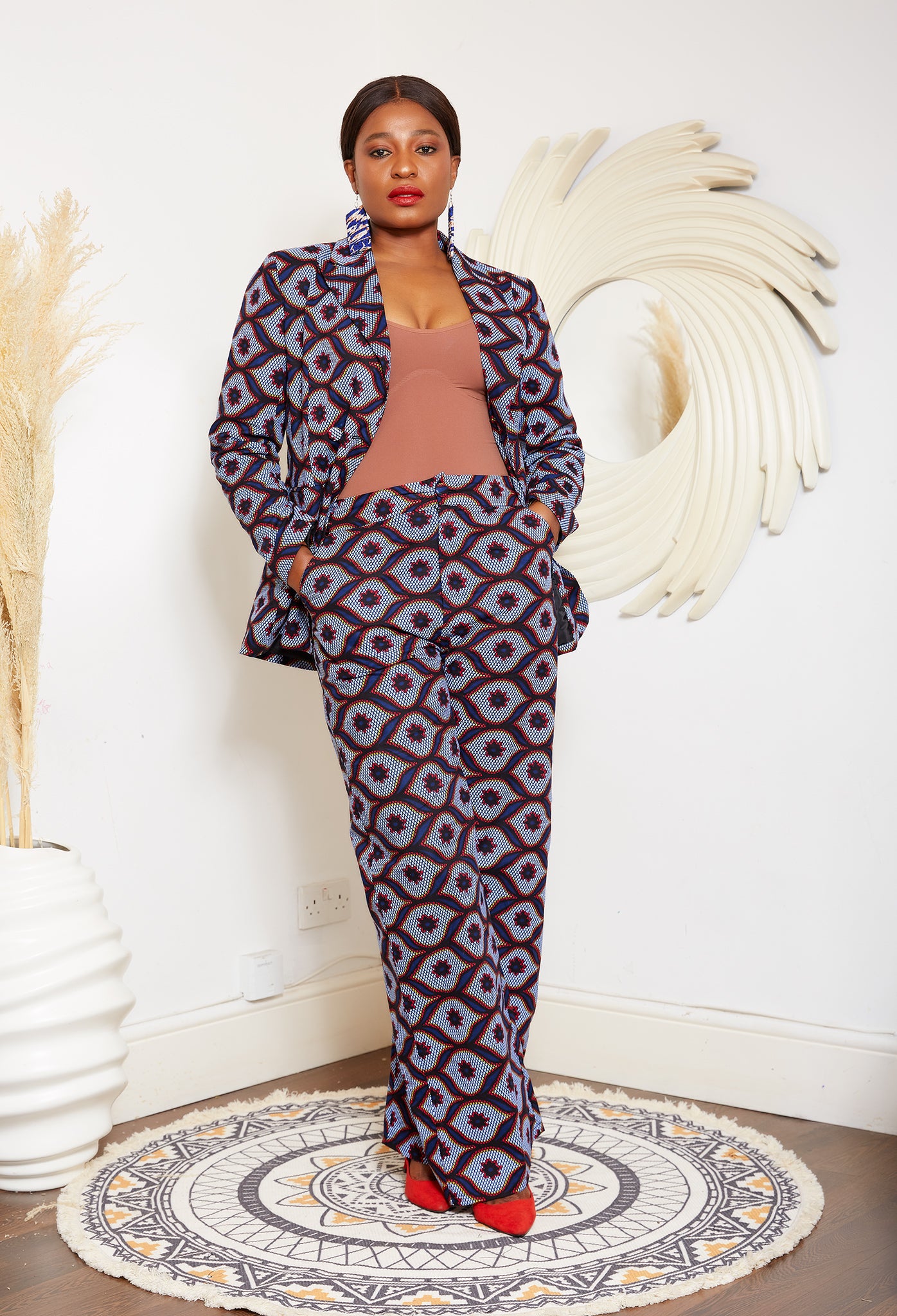 African print wide leg trousers | African print trousers UK | African print pants | African Print wide leg pants | African print clothing UK | Ready to wear African print pants | African Trouser styles | African clothing | African outfit | Ankara print Trousers | Ankara pants for Women | Ankara Styles Trousers for ladies | African pallazo Trousers | Danshiki Trousers | High waist African print wide leg pants | African high waist pants| African loose fit Trousers | African print Trousers