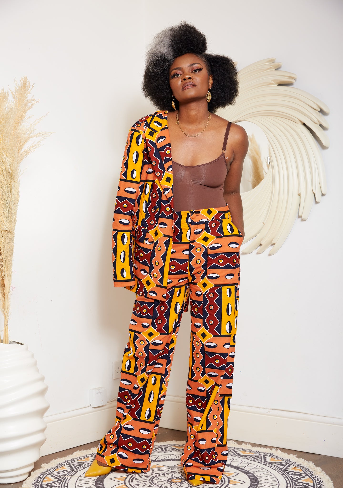 African print wide leg trousers | African print trousers UK | African print pants | African Print wide leg pants | African print clothing UK | Ready to wear African print pants | African Trouser styles | African clothing | African outfit | Ankara print Trousers | Ankara pants for Women | Ankara Styles Trousers for ladies | African pallazo Trousers | Danshiki Trousers | High waist African print wide leg pants | African high waist pants| African loose fit Trousers | African print Trousers