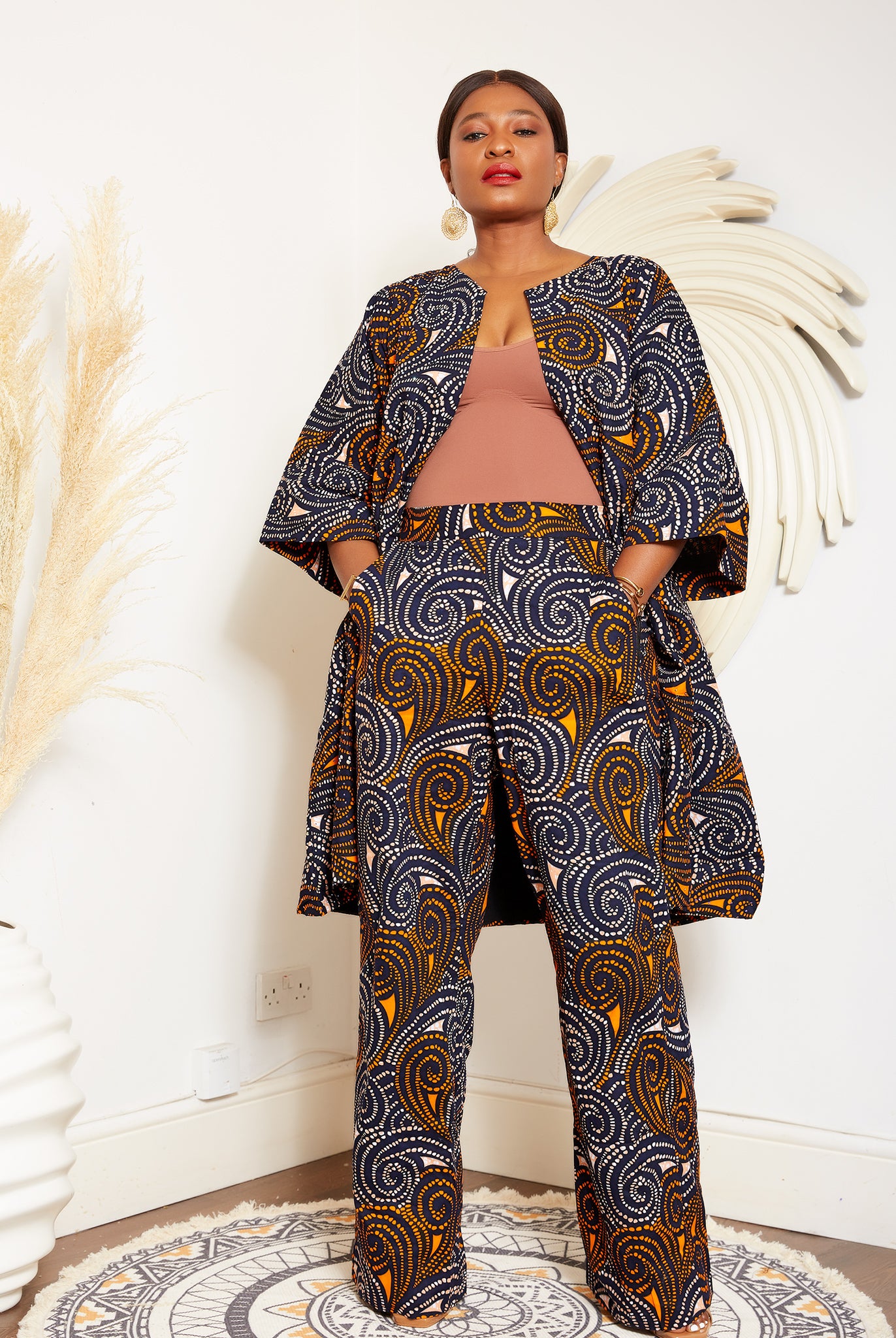 African Print Blazer | African print Jacket | African print Bomber Jacket | African Print Outerwear | Fall Fashion for African women | sustainable African Fashion | recycled African print clothing | Ethically sourced fashion | ethically sourced clothing | handmade clothing | African clothing for women | Ankara jacket | Tribal prints kimono | Floral African print clothing | Cotton Blazer | African print workwear | African clothing UK | Black-owned fashion brand | UK Based African Fashion Brand