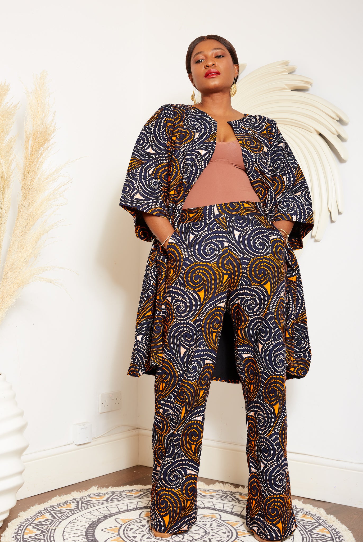 African Print Blazer | African print Jacket | African print Bomber Jacket | African Print Outerwear | Fall Fashion for African women | sustainable African Fashion | recycled African print clothing | Ethically sourced fashion | ethically sourced clothing | handmade clothing | African clothing for women | Ankara jacket | Tribal prints kimono | Floral African print clothing | Cotton Blazer | African print workwear | African clothing UK | Black-owned fashion brand | UK Based African Fashion Brand