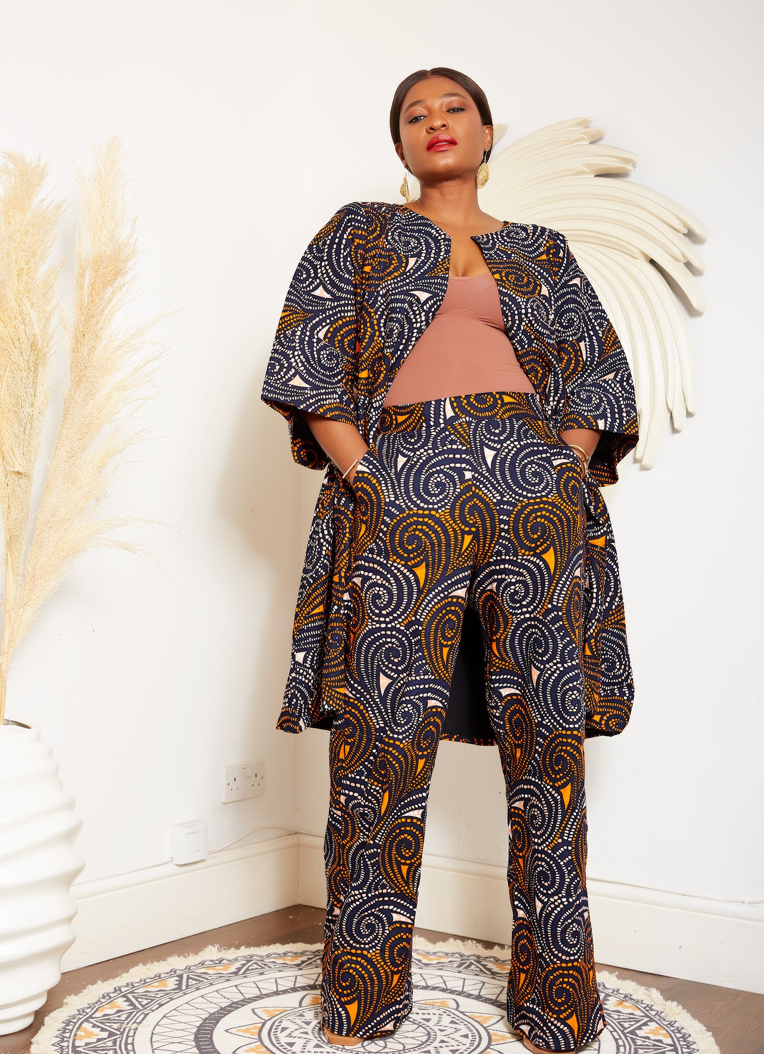 African Print Blazer | African print Jacket | African print Bomber Jacket | African Print Outerwear | Fall Fashion for African women | sustainable African Fashion | recycled African print clothing | Ethically sourced fashion | ethically sourced clothing | handmade clothing | African clothing for women | Ankara jacket | Tribal prints kimono | Floral African print clothing | Cotton Blazer | African print workwear | African clothing UK | Black-owned fashion brand | UK Based African Fashion Brand