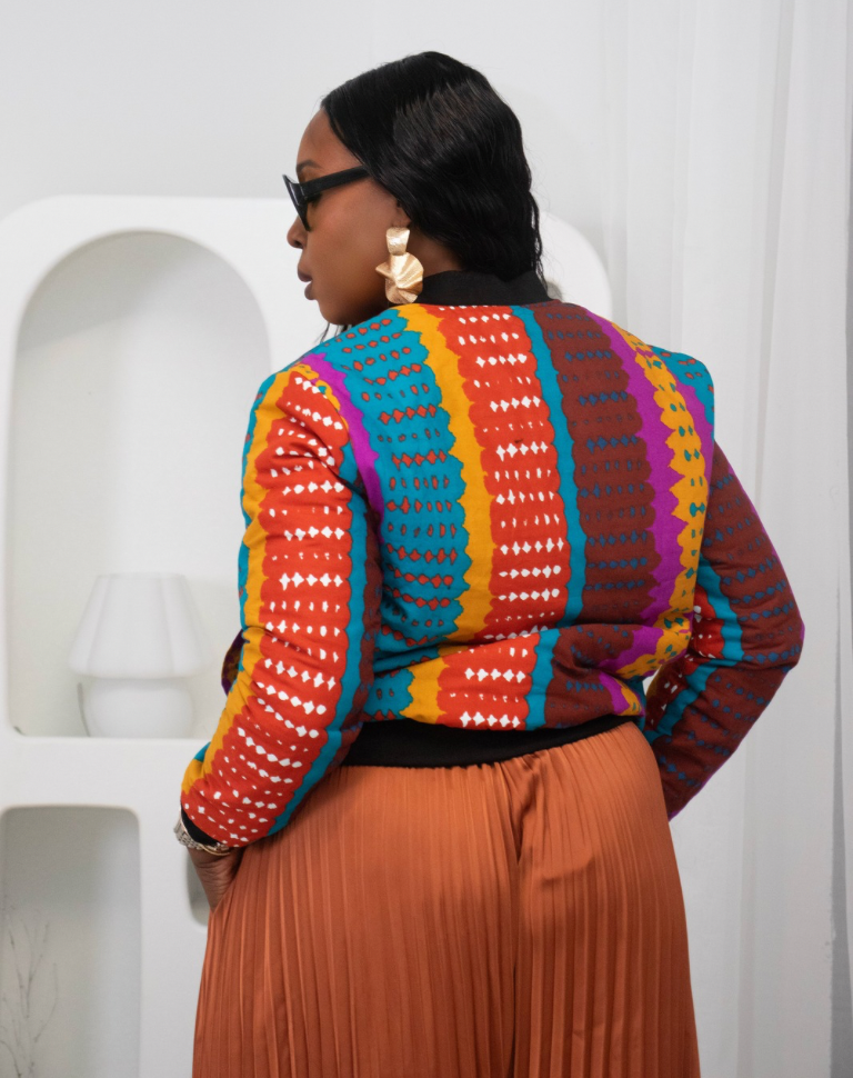 Reversible African Print Bomber Jacket with Black Viscose on the inner reverse | African print Biker Jacket | Ankara print Bomber Jacket | African Print Outerwear | African Winter  style for women | sustainable African Fashion | recycled African print clothing | Ethically sourced fashion | ethically sourced clothing | handmade clothing | African clothing for women | Ankara jacket | Tribal prints kimono | Floral African print clothing | Cotton Blazer | African print workwear | African clothing UK 
