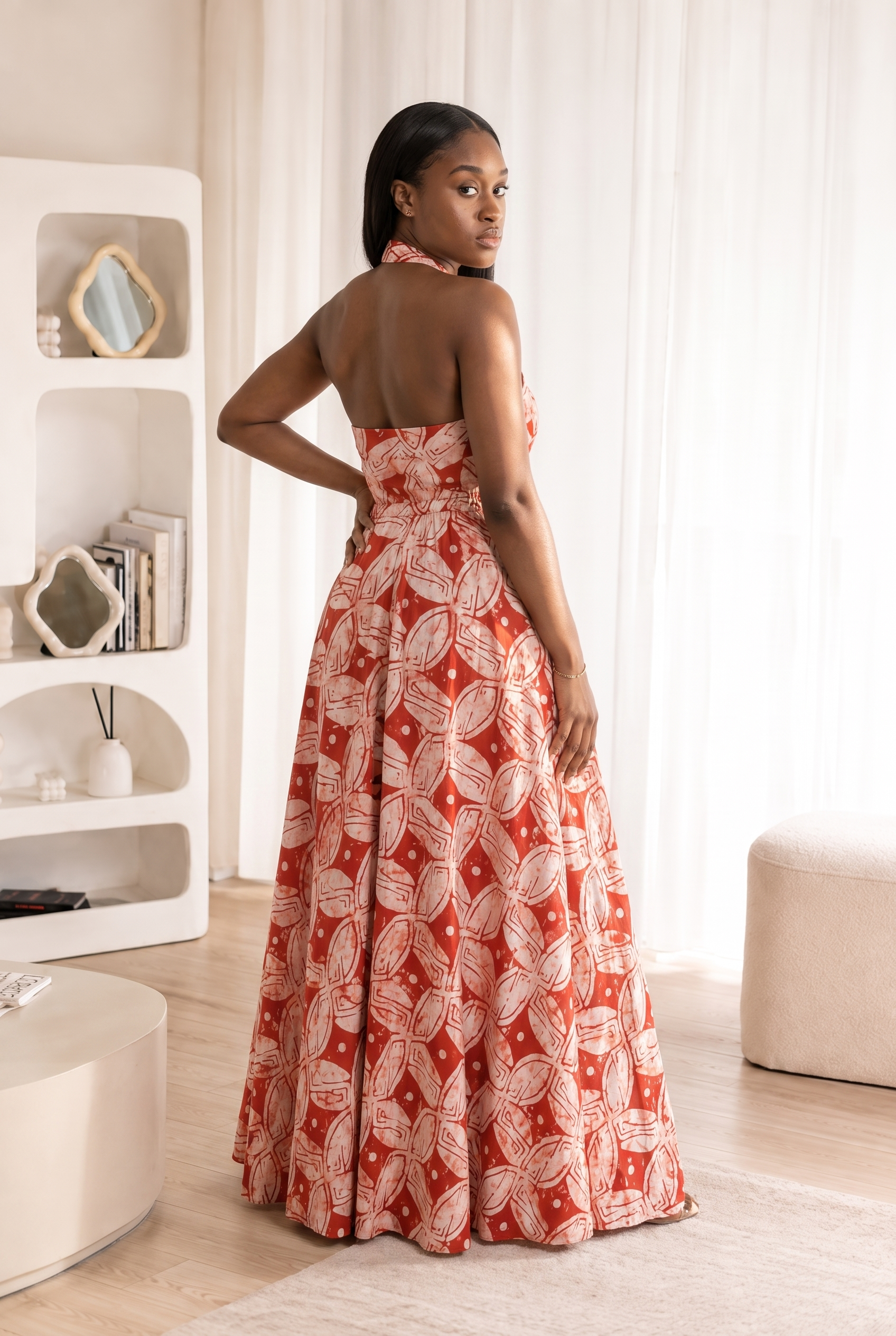 African Adire maxi dress, African print maxi dress UK, navy batik dress, halter maxi dress, African fashion UK, African wedding guest dress, luxury African clothing, contemporary African dress, cotton maxi dress with pockets, women's African clothing, CUMO London dress, African Adire clothing, elegant maxi dress, occasion dress UK, full skirt maxi dress. Kampala dresses, Adire outfits