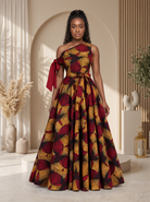 Asymmetric African Print Maxi dress perfect for any special occasion, African print maxi gown, plus size African fashion UK, puff sleeve maxi dress, colourful summer dress, statement occasion dress, luxury African clothing, vibrant maxi dress for women, African-inspired summer fashion, wedding guest dress UK, Celebrate Black History Month with Culture Dresses from CUMO London 