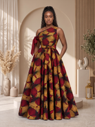 Asymmetric African Print Maxi dress perfect for any special occasion, African print maxi gown, plus size African fashion UK, puff sleeve maxi dress, colourful summer dress, statement occasion dress, luxury African clothing, vibrant maxi dress for women, African-inspired summer fashion, wedding guest dress UK, Celebrate Black History Month with Culture Dresses from CUMO London 