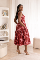 African batik dress, African print midi dress, bow print dress, maroon midi dress, African cotton dress, sweetheart neckline dress, gathered midi dress, African fashion UK, CUMO London dress, occasion dress UK, wedding guest dress, birthday dress, feminine African dress, cotton midi dress, statement midi dress.