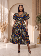 African print midi dress, African print dress UK, Ankara midi dress, puff sleeve African dress, African occasion dress, African wedding guest dress, fit and flare African dress, African wax print dress, contemporary African fashion, CUMO London dresses