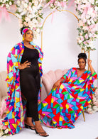 Discover trendy African clothing from CUMO London. This multicoloured V neckline African print Kaftan boubou is handmade featuring frill sleeves. One size fits all African boubou in vibrant bold colour  African Print Cover-ups Beach Tunics - Dashiki Kaftan Beach Dress |Boubou dress| African maxi gown| African kaftan | African bubu | African boubou | Midi Kaftan Bubu | African Maxi dresses | 