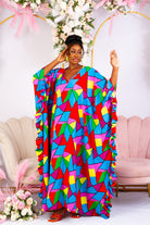 Shop African inspired clothing, African boubou, bubu, Maxi  Kaftan, African crepe gown, this long bubu kaftan for women  is handmade with multicoloured crepe fabric. V neckline with frill sleeves. 