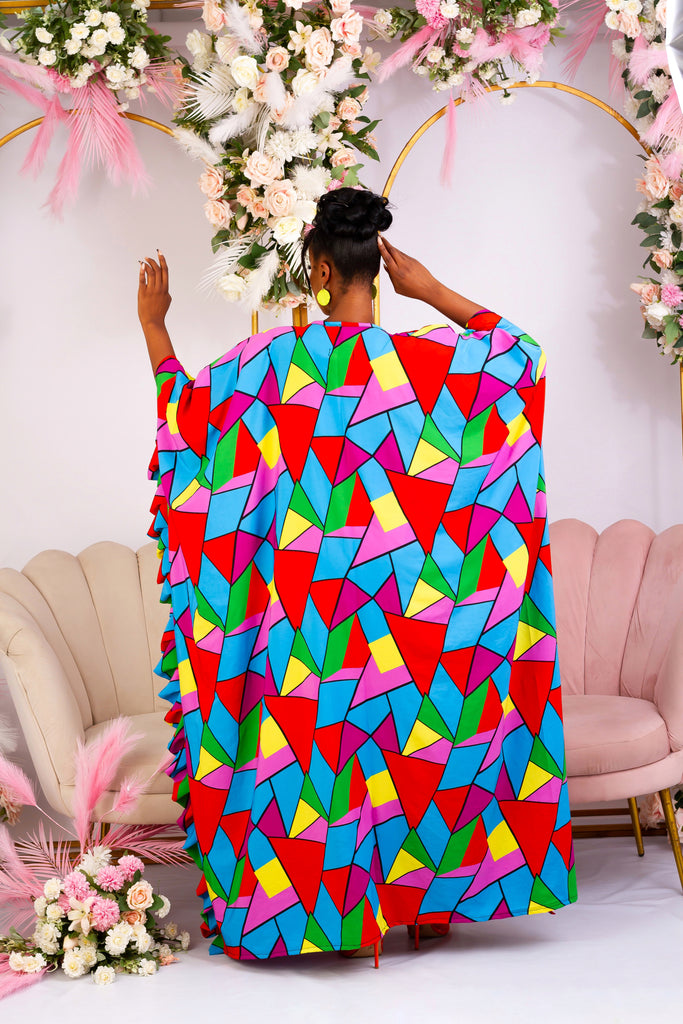 Back view of our summery African kaftan boubou. Shop African inspired clothing, African boubou, bubu, Maxi  Kaftan, African crepe gown, this long bubu kaftan for women  is handmade with multicoloured crepe fabric. V neckline with frill sleeves. 