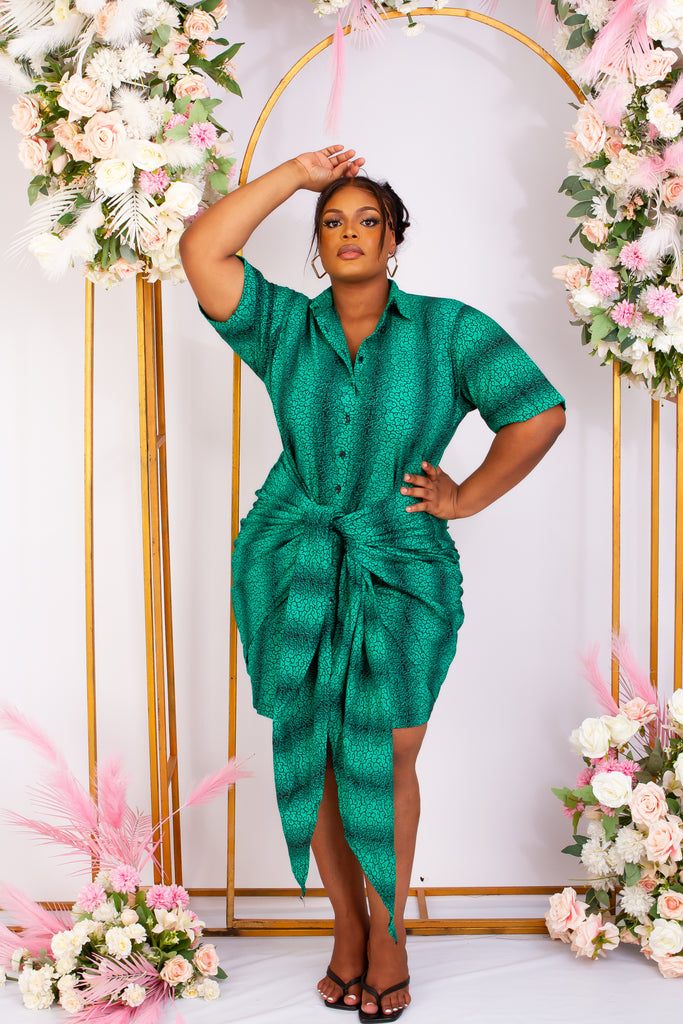 Green African Print Bodycon mini shirt dress perfect for a causal style. Short sleeve and front tie for an added edgy and chic look. Shop Ghana African print dress | African dress | African print Dress | African Clothing Online  Shop | Short African dress |  african women's clothing  | kitenge dresses | Africa Dresses for Women | African dresses for wedding | Danshiki Dress | Trendy African Dress | African clothing UK