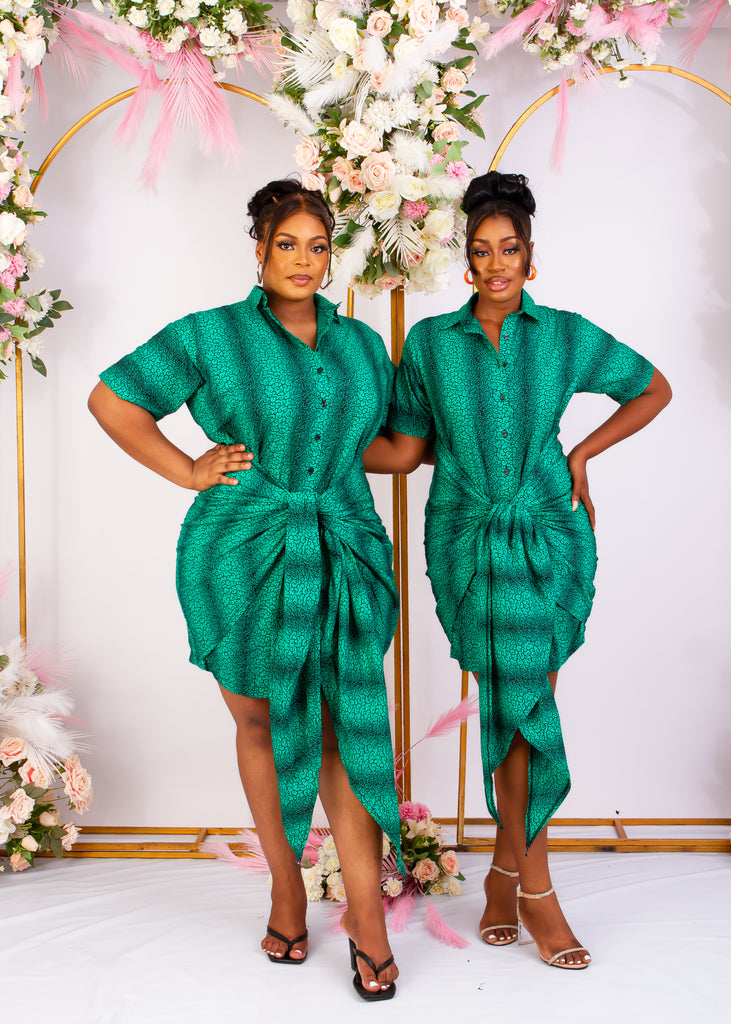 Green African Print Bodycon mini shirt dress perfect for a causal style. Short sleeve and front tie for an added edgy and chic look. Shop Ghana African print dress | African dress | African print Dress | African Clothing Online  Shop | Short African dress |  african women's clothing  | kitenge dresses | Africa Dresses for Women | African dresses for wedding | Danshiki Dress | Trendy African Dress | African clothing UK