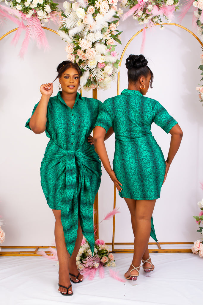 Green African Print Bodycon mini shirt dress perfect for a causal style. Short sleeve and front tie for an added edgy and chic look. Shop Ghana African print dress | African dress | African print Dress | African Clothing Online  Shop | Short African dress |  african women's clothing  | kitenge dresses | Africa Dresses for Women | African dresses for wedding | Danshiki Dress | Trendy African Dress | African clothing UK