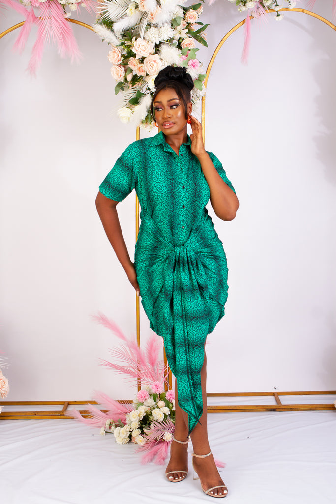 Green African Print Bodycon mini shirt dress perfect for a causal style. Short sleeve and front tie for an added edgy and chic look. Shop Ghana African print dress | African dress | African print Dress | African Clothing Online  Shop | Short African dress |  african women's clothing  | kitenge dresses | Africa Dresses for Women | African dresses for wedding | Danshiki Dress | Trendy African Dress | African clothing UK