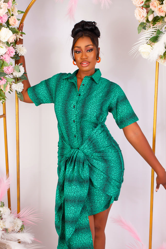 Green African Print Bodycon mini shirt dress perfect for a causal style. Short sleeve and front tie for an added edgy and chic look. Shop Ghana African print dress | African dress | African print Dress | African Clothing Online  Shop | Short African dress |  african women's clothing  | kitenge dresses | Africa Dresses for Women | African dresses for wedding | Danshiki Dress | Trendy African Dress | African clothing UK