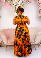 Vibrant Yellow and Navy Blue African Print flare maxi dress perfect for a special occasion. Sleeveless with bust cut out for an edgy and chic look. Shop Ghana African print dress | African maxi dresses | African print gown | African Clothing Online  Shop | Maxi African dress |  African women's clothing  | kitenge dresses | Africa Dresses for Women | African dresses for wedding | Danshiki Dress | Trendy African Dress | African clothing UK