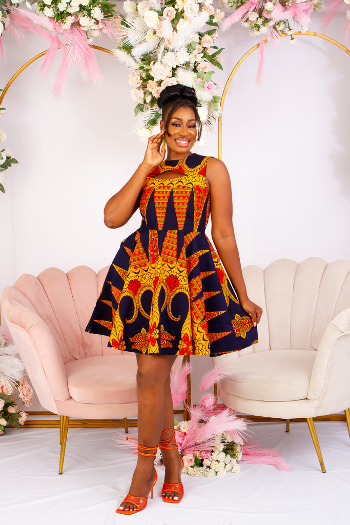 Vibrant Yellow and Navy Blue African Print flare mini dress perfect for a special occasion. Sleeveless with bust cut out for an edgy and chic look. Shop Ghana African print dress | African short dresses | African print gown | African Clothing Online Shop | Maxi African dress | African women's clothing | kitenge dresses | Africa Dresses for Women | African dresses for wedding | Danshiki Dress | Trendy African Dress | African clothing UK