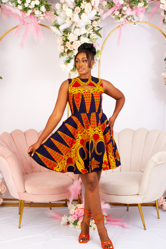 Vibrant Yellow and Navy Blue African Print flare mini dress perfect for a special occasion. Sleeveless with bust cut out for an edgy and chic look. Shop Ghana African print dress | African short dresses | African print gown | African Clothing Online Shop | Maxi African dress | African women's clothing | kitenge dresses | Africa Dresses for Women | African dresses for wedding | Danshiki Dress | Trendy African Dress | African clothing UK