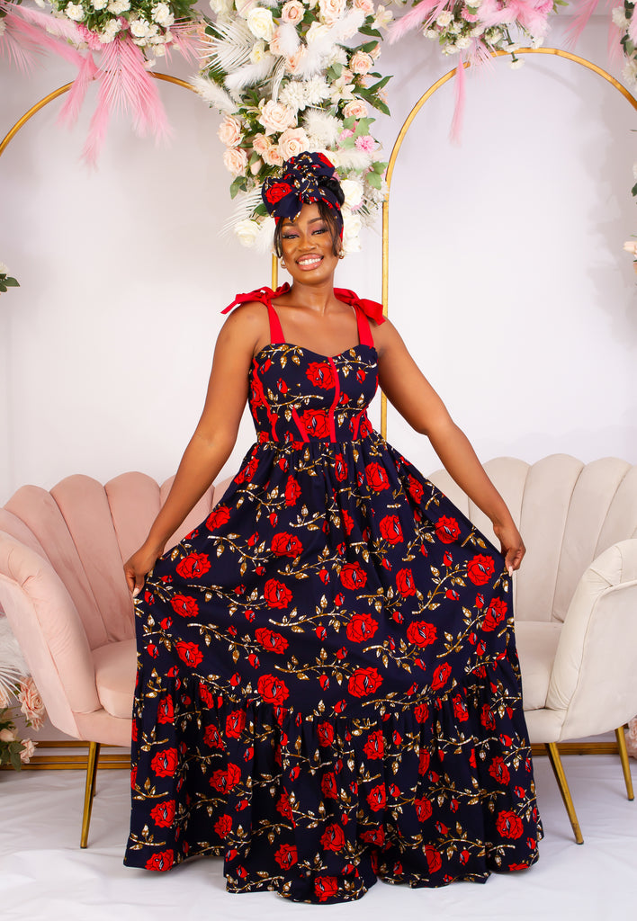 Discover this beautiful Navy Blue with Red Rose African Print Maxi Dress. Adjustable Red sleeves and 2 step gown. Ghana African dress | wedding guest dress | African dress | African print Dress | African Clothing Online  Shop | Short African dress |  african women's clothing  | kitenge dresses | Africa Dresses for Women | African dresses for wedding | Danshiki Dress | Trendy African Dress | Modern African Clothing | Modern African dress UK | African clothing UK 