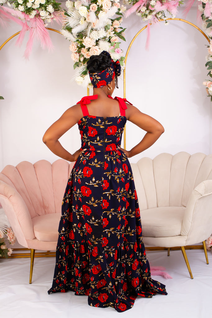 Discover this beautiful Navy Blue with Red Rose African Print Maxi Dress. Adjustable Red sleeves and 2 step gown. Ghana African dress | wedding guest dress | African dress | African print Dress | African Clothing Online  Shop | Short African dress |  african women's clothing  | kitenge dresses | Africa Dresses for Women | African dresses for wedding | Danshiki Dress | Trendy African Dress | Modern African Clothing | Modern African dress UK | African clothing UK 