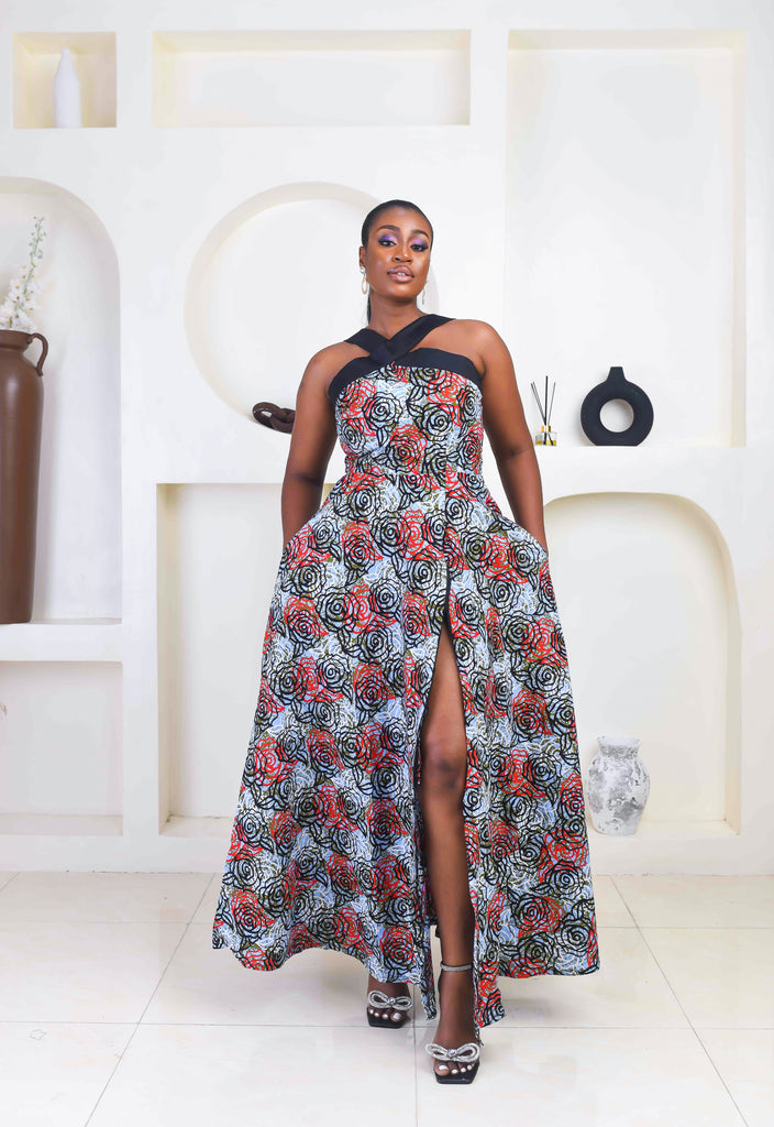 Vibrant Yellow and Navy Blue African Print flare maxi dress perfect for a special occasion. Sleeveless with bust cut out for an edgy and chic look. Shop Ghana African print dress | African maxi dresses | African print gown | African Clothing Online Shop | Maxi African dress | African women's clothing | kitenge dresses | Africa Dresses for Women | African dresses for wedding | Danshiki Dress | Trendy African Dress | African clothing UK