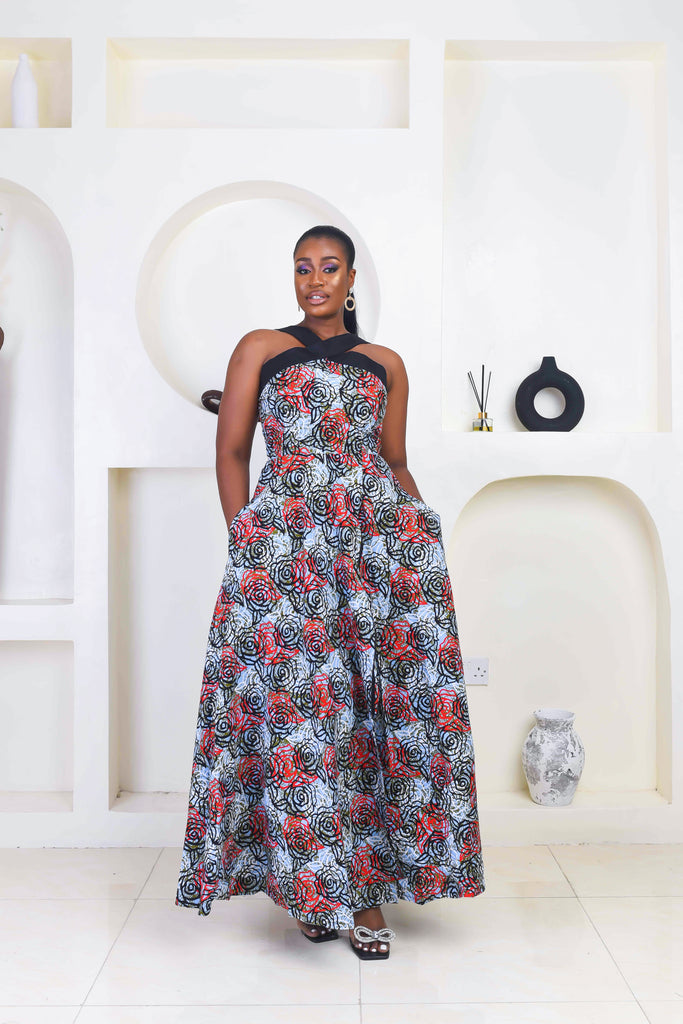 Vibrant Yellow and Navy Blue African Print flare maxi dress perfect for a special occasion. Sleeveless with bust cut out for an edgy and chic look. Shop Ghana African print dress | African maxi dresses | African print gown | African Clothing Online Shop | Maxi African dress | African women's clothing | kitenge dresses | Africa Dresses for Women | African dresses for wedding | Danshiki Dress | Trendy African Dress | African clothing UK