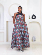 Vibrant Yellow and Navy Blue African Print flare maxi dress perfect for a special occasion. Sleeveless with bust cut out for an edgy and chic look. Shop Ghana African print dress | African maxi dresses | African print gown | African Clothing Online Shop | Maxi African dress | African women's clothing | kitenge dresses | Africa Dresses for Women | African dresses for wedding | Danshiki Dress | Trendy African Dress | African clothing UK