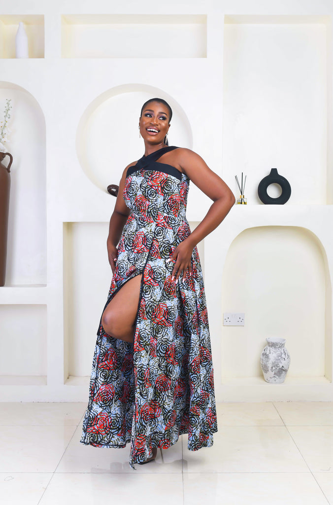 Vibrant Yellow and Navy Blue African Print flare maxi dress perfect for a special occasion. Sleeveless with bust cut out for an edgy and chic look. Shop Ghana African print dress | African maxi dresses | African print gown | African Clothing Online Shop | Maxi African dress | African women's clothing | kitenge dresses | Africa Dresses for Women | African dresses for wedding | Danshiki Dress | Trendy African Dress | African clothing UK