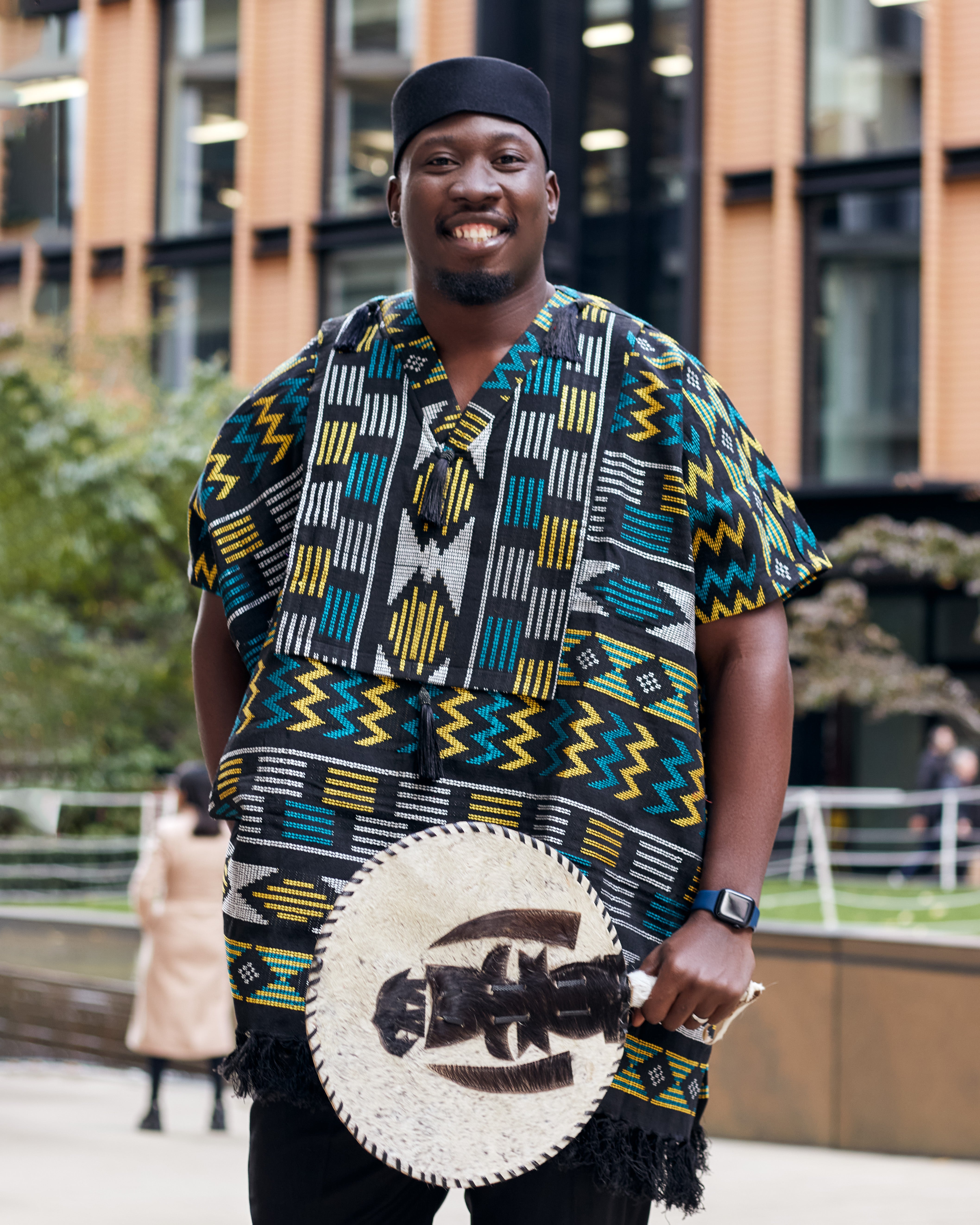 Model wearing men’s Akwete kaftans in rich woven designs, perfect for weddings, cultural events, and stylish traditional African menswear.