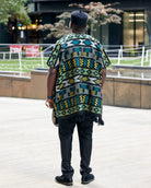 Back view of Model wearing men’s Akwete kaftans in rich woven designs, perfect for weddings, cultural events, and stylish traditional African menswear.
