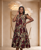 African print midi dress, tiered summer dress, casual African fashion UK, floral midi dress for women, relaxed fit summer dress, colourful everyday dress, African-inspired women’s clothing, breathable summer fashion, elegant midi dress UK