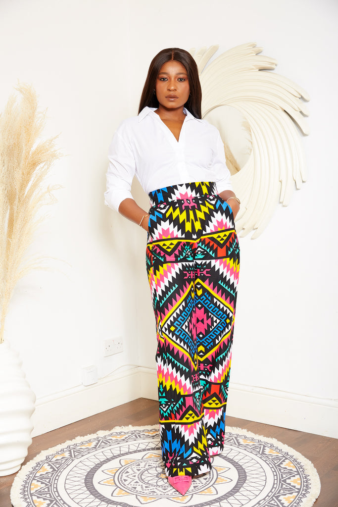 African print wide leg trousers | African print trousers UK | African print pants | African Print wide leg pants | African print clothing UK | Ready to wear African print pants | African Trouser styles | African clothing | African outfit | Ankara print  Trousers | Ankara pants for Women | Ankara Styles Trousers for ladies | African pallazo Trousers | Danshiki Trousers | High waist African print wide leg pants | African high waist pants| African loose fit Trousers | African print Trousers