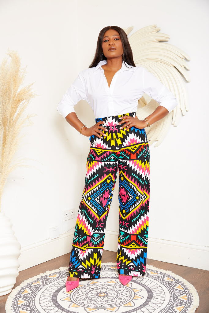 African print wide leg trousers | African print trousers UK | African print pants | African Print wide leg pants | African print clothing UK | Ready to wear African print pants | African Trouser styles | African clothing | African outfit | Ankara print  Trousers | Ankara pants for Women | Ankara Styles Trousers for ladies | African pallazo Trousers | Danshiki Trousers | High waist African print wide leg pants | African high waist pants| African loose fit Trousers | African print Trousers